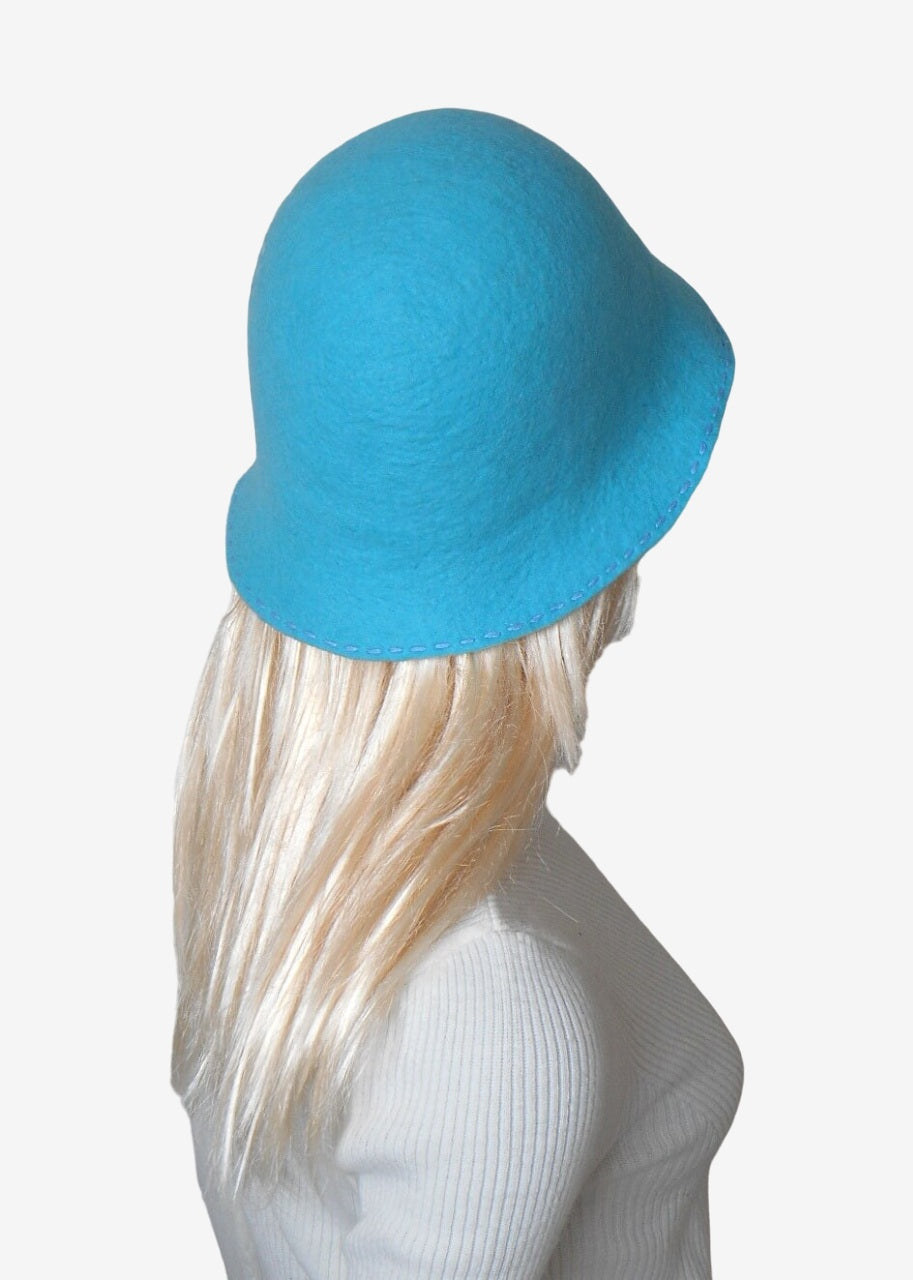 Turquoise winter felted cloche hat