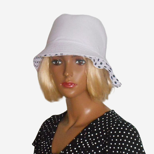 White linen summer hat for women with black polka dot accent