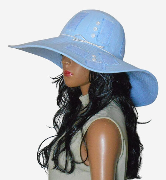 Side view of light blue wide-brim sun hat, showing stylish design and sun protection