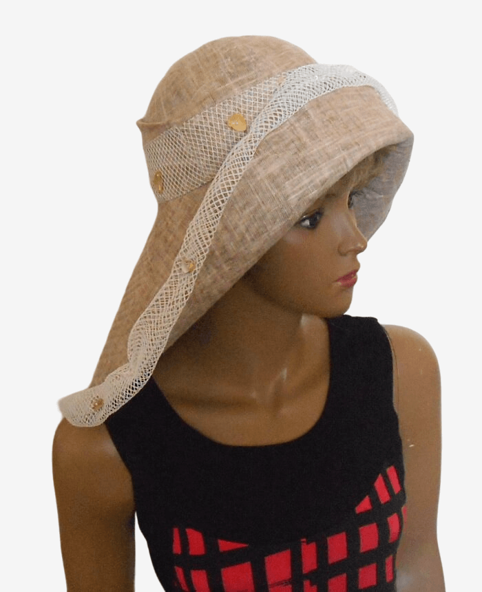 Beige hat with asymmetrical brim