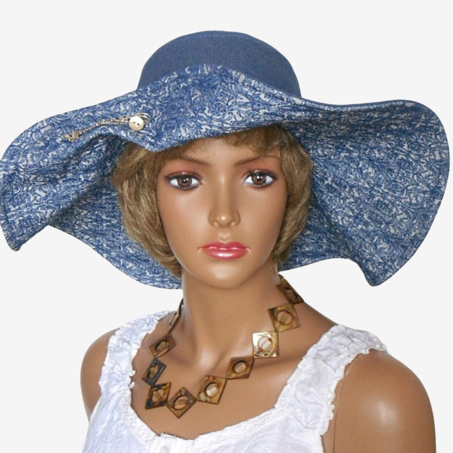 Front view of women’s wide-brim denim hat