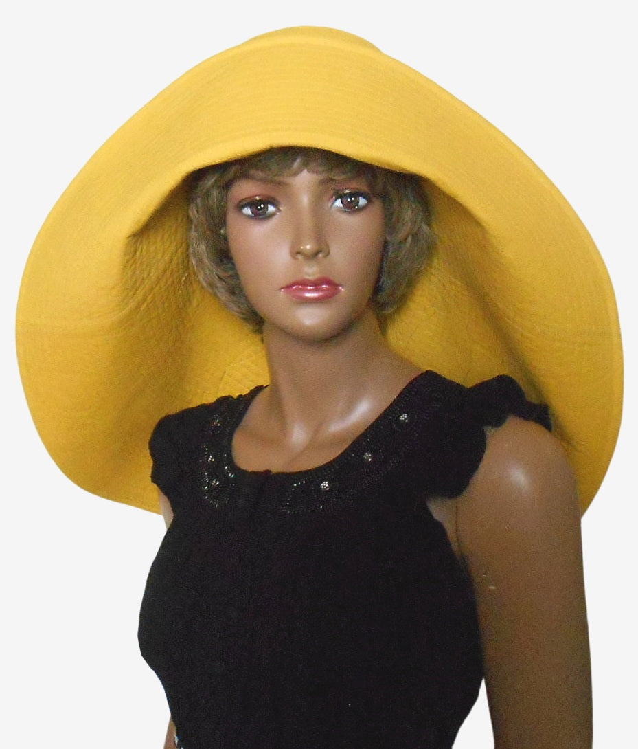 Yellow wide brim linen sun hat with asymmetrical brim, front view