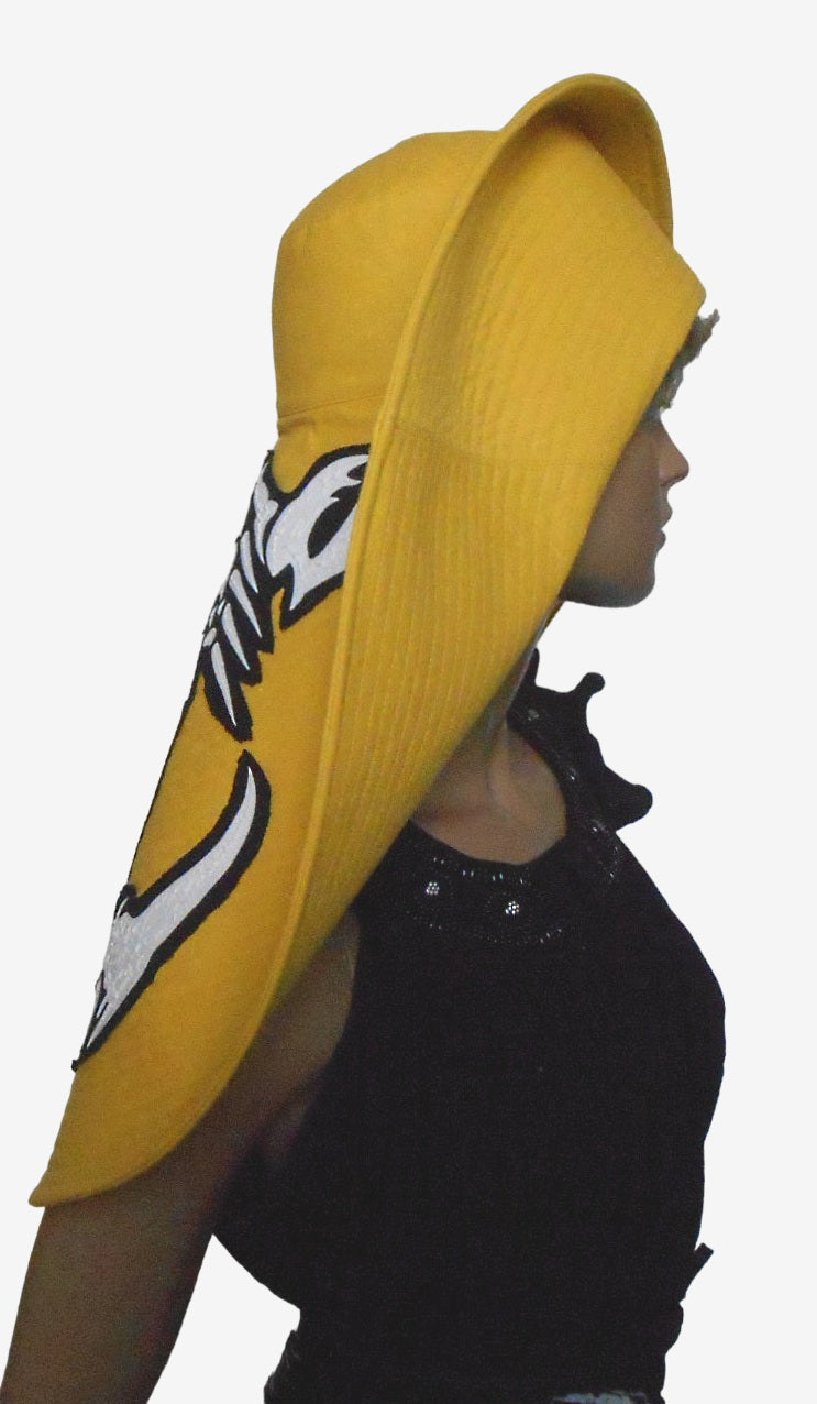 Yellow asymmetrical wide brim linen hat, side view