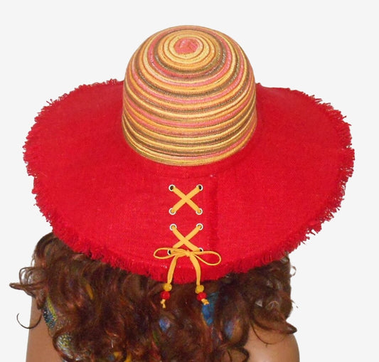 Back view of yellow red wide-brim linen hat with fringe detail and colorful crown, stylish summer accessory