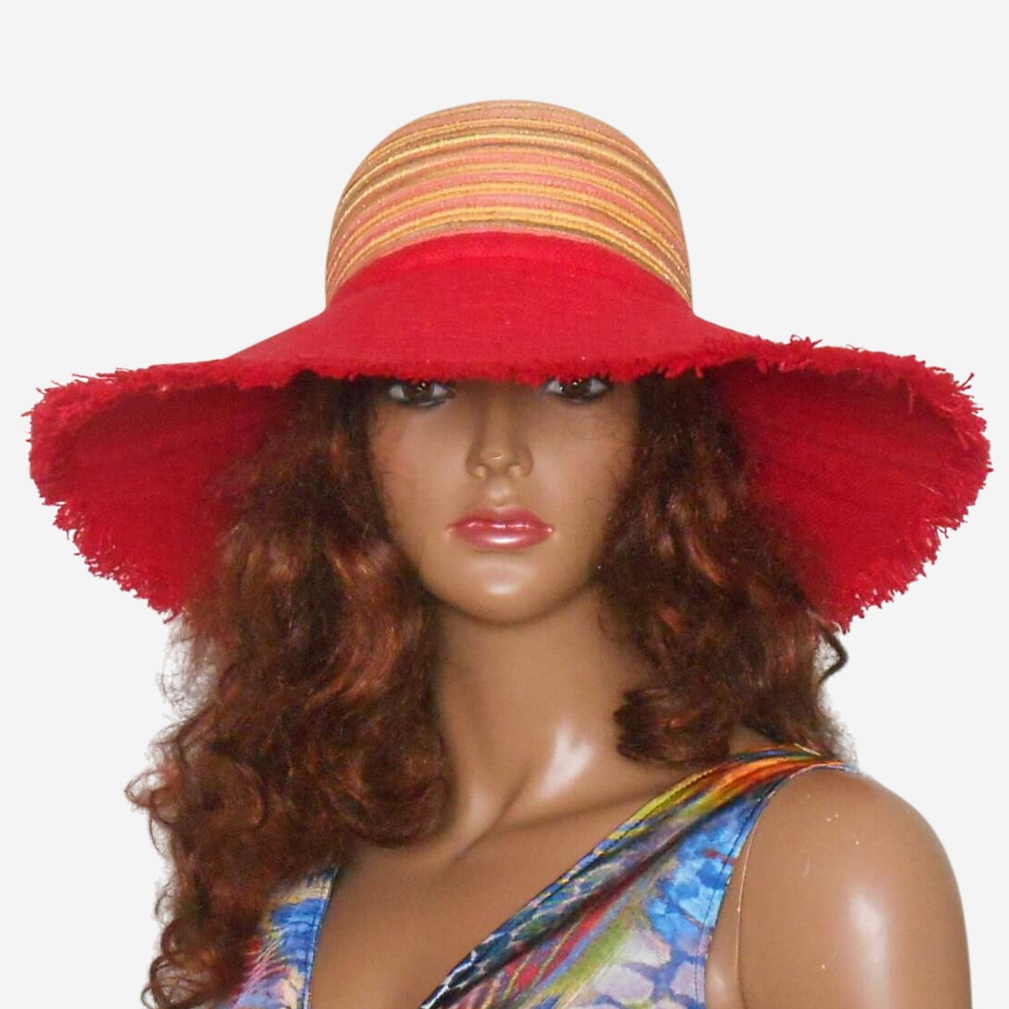 Front view of yellow red wide-brim linen hat with fringed edges and multicolored crown, lightweight summer hat