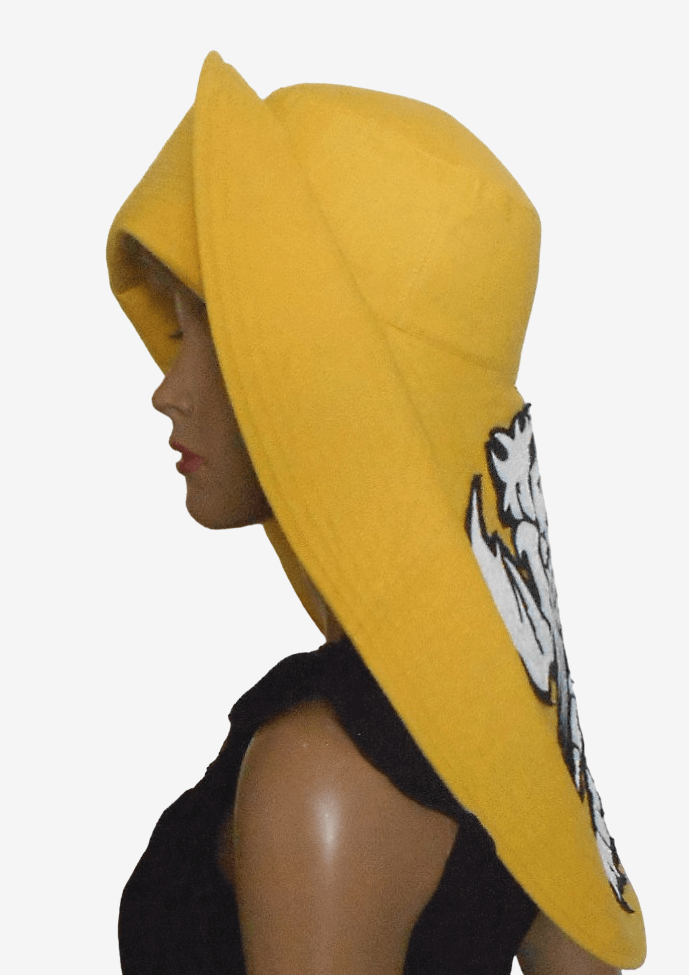 Yellow asymmetrical brim linen hat, side view